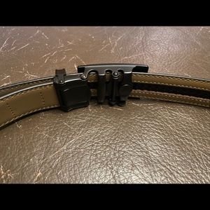 Mens new without tags Rachet Belt. 40”-46”
